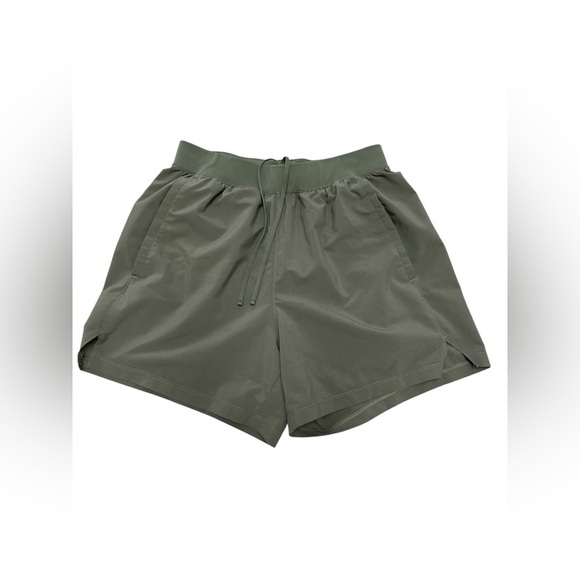 Under Armour Pants - Under armour green athletic workout shorts